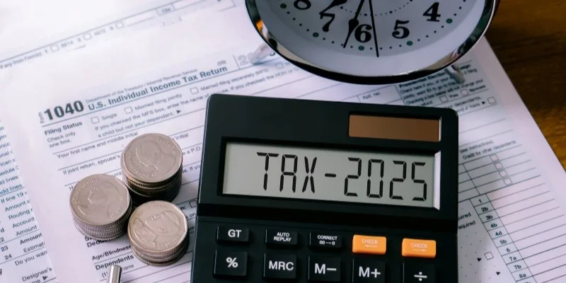 Calculator with tax 2025 on it